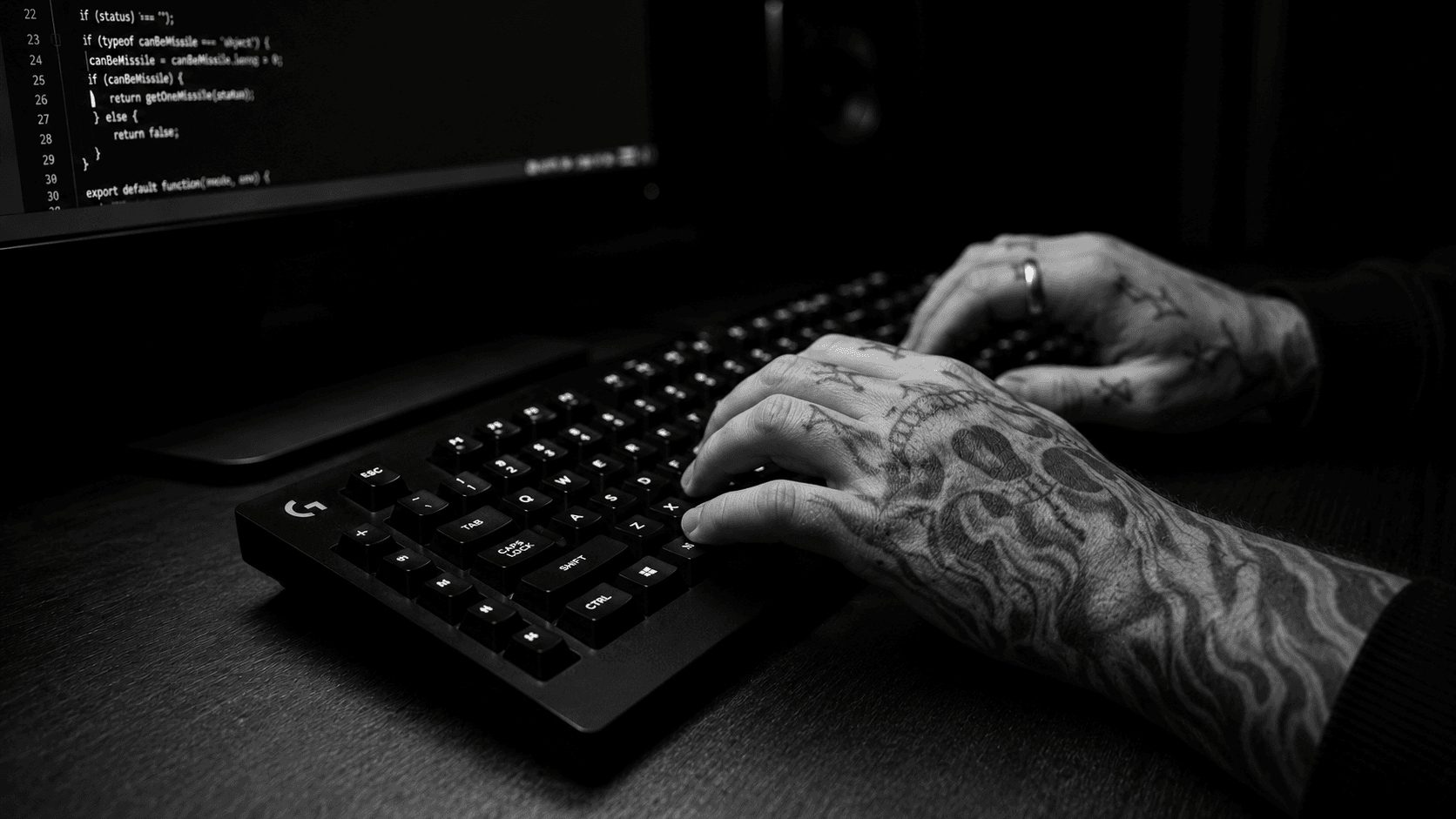 Closeup of hands working at a keyboard